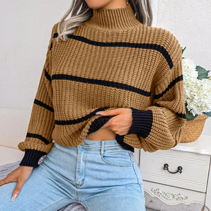 Tan and black striped chunky turtleneck sweater featuring long sleeves and a cozy collar, perfect for casual winter wear.