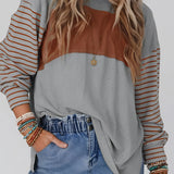 Women's striped color block long sleeve casual pullover sweater, featuring a relaxed fit with a round neckline and vibrant color patterns.