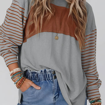 Women's striped color block long sleeve casual pullover sweater, featuring a relaxed fit with a round neckline and vibrant color patterns.