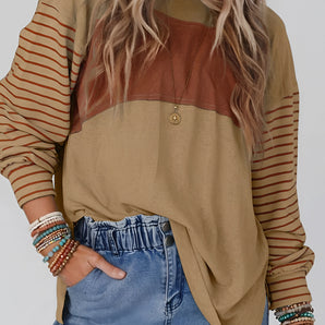 Women's striped color block long sleeve casual pullover sweater in shades of orange and white, featuring a comfortable fit and stylish design.