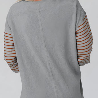 Striped color block long sleeve casual pullover sweater for women featuring a combination of white and other colors, with a relaxed fit, designed for casual wear.