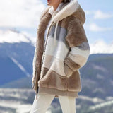 Striped fleece women's hooded Sherpa jacket in warm colorblock design, featuring plush material and a cozy hood, perfect for cold weather.