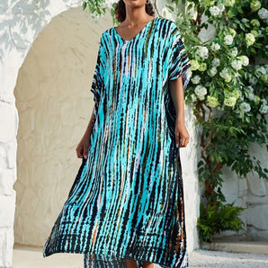 Plus size casual beachwear maxi kaftan dress with turquoise and black stripes, featuring long sleeves and a relaxed fit.
