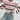 Striped women's black and white crew neck sweater featuring a chic winter knitwear design. The sweater is shown on a model showcasing the shoulder and sleeve details with a focus on the cozy textile and stylish neckline.