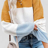 Striped women's color block sweater in yellow, size 3XL, featuring a stylish knit design with long sleeves, modeled over jeans.
