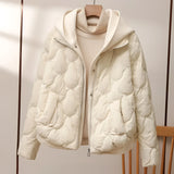 Quilted insulated puffer jacket in alpine white with a high collar and fashionably designed sleeves, featuring a stylish pattern and luxe fur detailing.