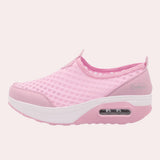 Stylish black slip-on mesh sneakers featuring an air-cushion sole, designed for outdoor activities and walking.