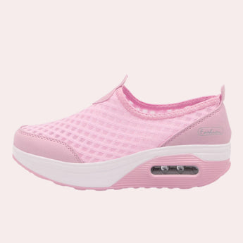 Stylish black slip-on mesh sneakers featuring an air-cushion sole, designed for outdoor activities and walking.