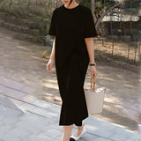 A black twisted tee featuring a stylish knot detail, with short sleeves and a comfortable fit in size 3XL.