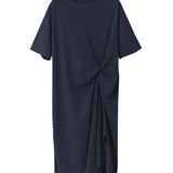 Stylish green twisted tee with knot detail, featuring short sleeves and a round neckline.