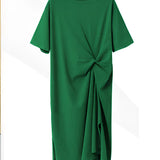 
A stylish green tee featuring a knot detail and twisted design with short sleeves.