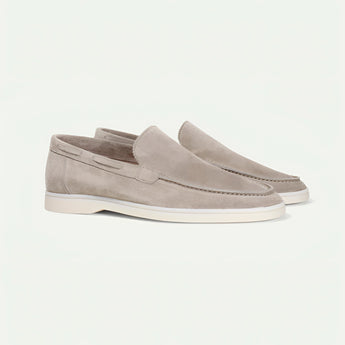 Stylish grey suede men's slip-on loafers in light beige, size 45, displayed against a neutral background.