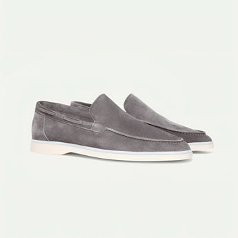 Light gray suede men's slip-on loafers, lightweight casual shoes, size 45, with sleek design and comfortable fit.