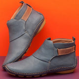 Stylish men's tan slip-on leather ankle boots with a durable sole, featuring a sleek design suitable for casual or formal wear.