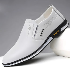 Stylish men's white leather slip-on loafers displayed against a neutral background, highlighting their lightweight and breathable design.