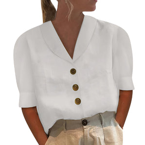 Woman wearing a stylish white linen V-neck button-up short sleeve summer blouse in size 2XL.