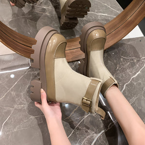 Stylish women's beige suede ankle boots featuring a chunky heel and decorative buckle strap.
