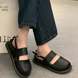 Stylish women's black platform orthopedic sandals with an ankle strap, featuring a sleek design ideal for comfort and fashion.
