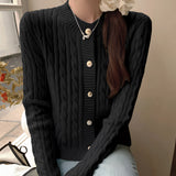 Stylish women's black quilted bomber jacket featuring gold button detail, displayed in a one-size fit, with a collar and long sleeves.