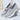 Stylish women's gray slip-on sneakers in size 42, featuring a lightweight and breathable design ideal for outdoor activities and walking.