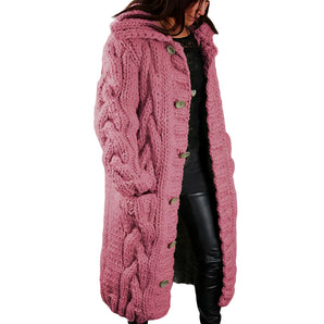 Stylish women's pink chunky knit cardigan featuring a cozy design, long sleeves, and a wide collar, ideal for winter fashion.