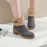 Stylish women's shearling lined tan suede winter boots in gray, size 42, showcasing a fashionable design.
