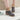 Stylish women's shearling lined tan suede winter boots in gray, size 42, showcasing a fashionable design.