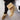 Stylish women's tan suede winter boots with shearling lining, shown in camel color and size 42, featuring a cozy leg fit and fashionable design.