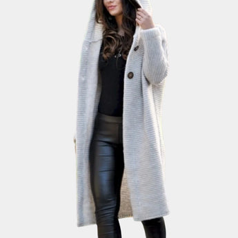 Stylish women's yellow hooded vest with a bold textured design, featuring a beige color in size 3XL, showcasing long sleeves, a cozy hood, and a waist-length cut ideal for winter wear.
