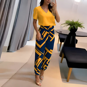 Stylish yellow-blue blouse with graphic print featuring a floral pattern paired with matching graphic print trousers in a 2XL size.