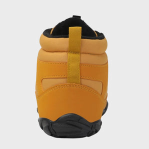 
A pair of stylish yellow fleece-lined waterproof winter boots designed for comfort and fashion, featuring a durable material suitable for cold weather conditions.