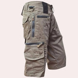 Light brown tactical cargo pants featuring multiple pockets and zippers, designed for outdoor use in a 3XL size.