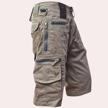 Light brown tactical cargo pants featuring multiple pockets and zippers, designed for outdoor use in a 3XL size.