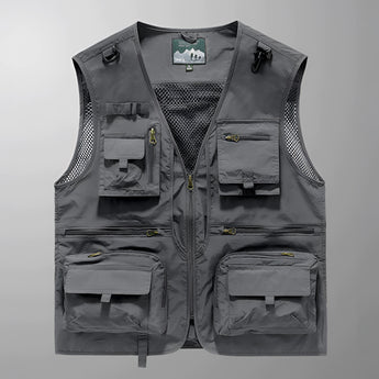 Gray tactical multi-pocket vest in size 3XL featuring breathable mesh fabric and zippered compartments, designed for outdoor use and styled with fashion design elements.