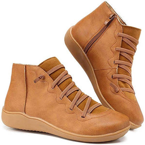 Brown leather high-top sneakers with a zipper, featuring a cushioned sole, displayed in size 43.