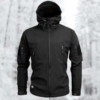 Black tactical hoodie in 2XL size, featuring a soft-shell design with water-resistant properties, modeled by a man with a beard wearing a grey cap. The hoodie has a structured collar and long sleeves.