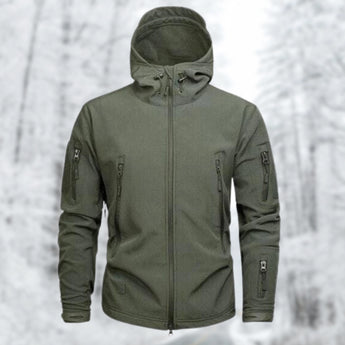 Green military-grade tactical hoodie in size 2XL, featuring an insulated soft-shell design with water-resistant properties. The image shows a close-up of a person wearing the hoodie, highlighting the shoulder, neck, and sleeve areas. The person also has a beard.