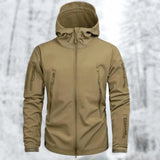 Tan tactical hoodie in camel color, size 2XL, featuring a soft-shell, insulated, water-resistant design with military-grade quality. The jacket has long sleeves, a high collar, and is suitable for outdoor wear, resembling a combination of parka and overcoat.