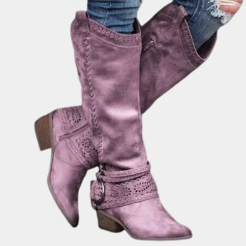 Taupe suede knee-high boots with a Western-inspired design featuring a studded heel and a side zipper, in a purple color and size 42, displayed against a contrasting background.