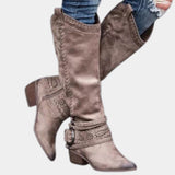 Taupe suede knee-high boots with a western-inspired design featuring a studded heel and side zipper, shown in a khaki color, size 42.