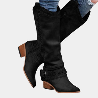 Taupe suede knee-high boots featuring Western-inspired design with studded heel and side zipper, displayed in black color variant, size 42.