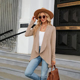 Teal long sleeve knit cardigan displayed on a mannequin, showcasing its texture and design as a stylish outerwear piece for fall fashion layering.