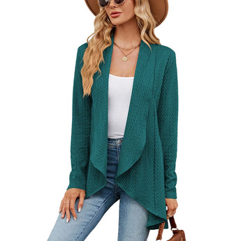 Teal long sleeve knit cardigan worn by a person, showcasing fall fashion layering. The cardigan is in an evergreen color, available in size 2XL, and is styled over a dress shirt. The person is accessorized with sunglasses.