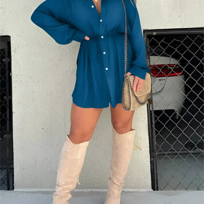 Teal oversized shirt dress paired with thigh-high suede boots, showcasing a casual chic style, worn by a model with eyewear.