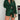 Teal oversized shirt dress paired with thigh-high suede boots, model wearing dark green variant in size 5XL, showcasing a casual chic style while standing.
