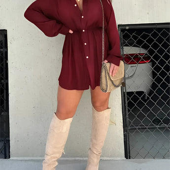 Teal oversized shirt dress paired with thigh-high suede boots in a casual chic style, featuring a model standing with a slight pose to showcase the boots, holding sunglasses, and wearing a red wine color option in size 5XL.