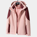 Women's waterproof breathable hiking jacket in pink with long sleeves and a collar, lightweight and windproof design, suitable for outdoor activities.