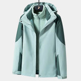 
A teal women's lightweight and windproof hiking jacket with long sleeves, featuring a button-up front and a high collar. The jacket is designed to be waterproof and breathable, suitable for outdoor activities. It is displayed in a 4XL size and has a sleek, fashion-forward design.