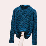 Textured black floral embossed high-collar women's top in blue, featuring long sleeves and a structured collar.