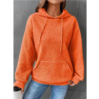 Textured waffle knit hoodie in orange, designed for women in a cozy 3XL size, featuring a comfortable pullover style with long sleeves and a relaxed fit.